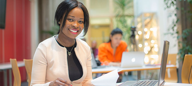 Student smiling into camera